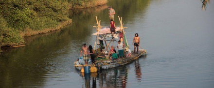 The 2013 recicling raft Saly travels with the tidal current up and down river Sal in Goa, India
